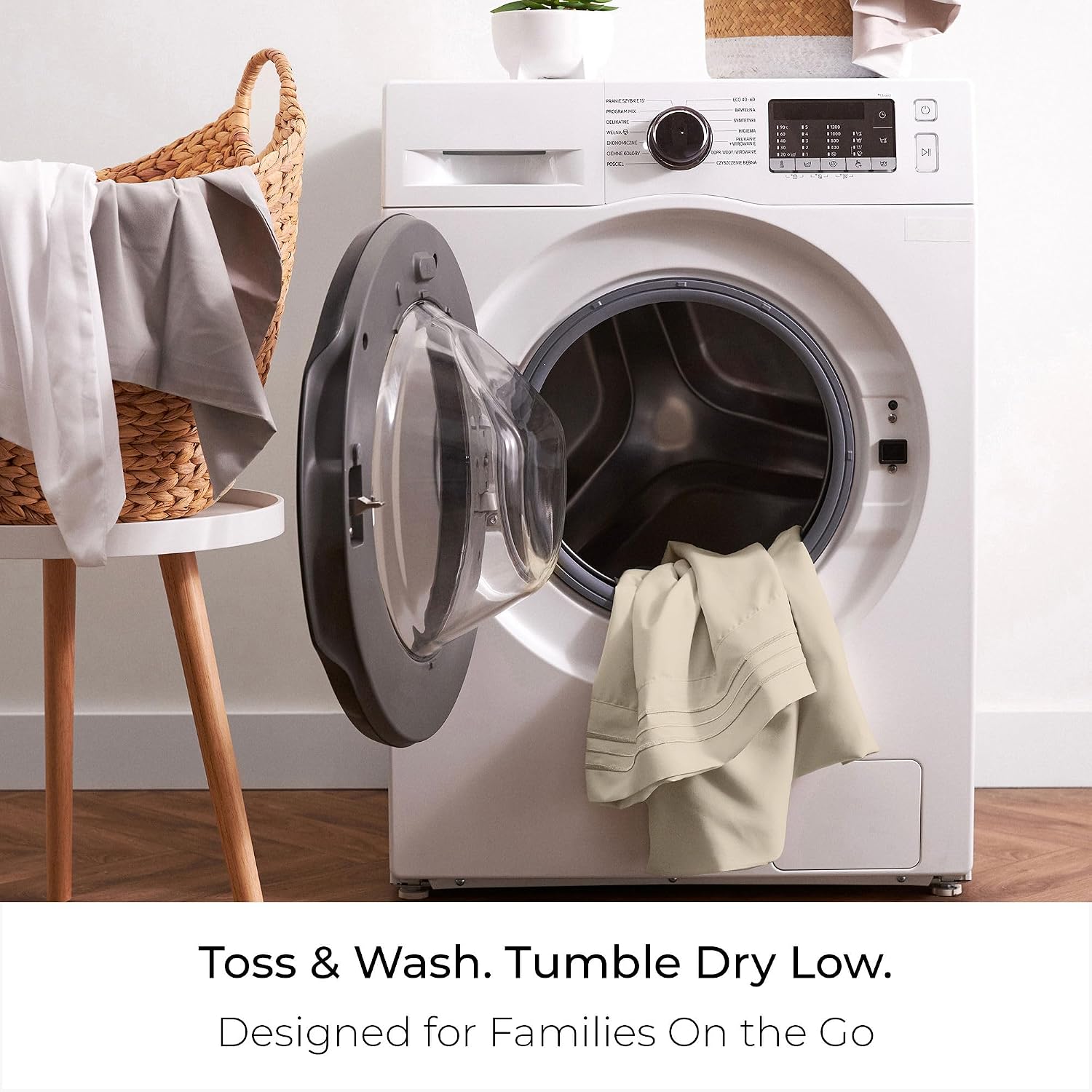 Mellanni sheets tumbling out of a washing machine, captioned Toss & Wash, Tumble Dry Low.