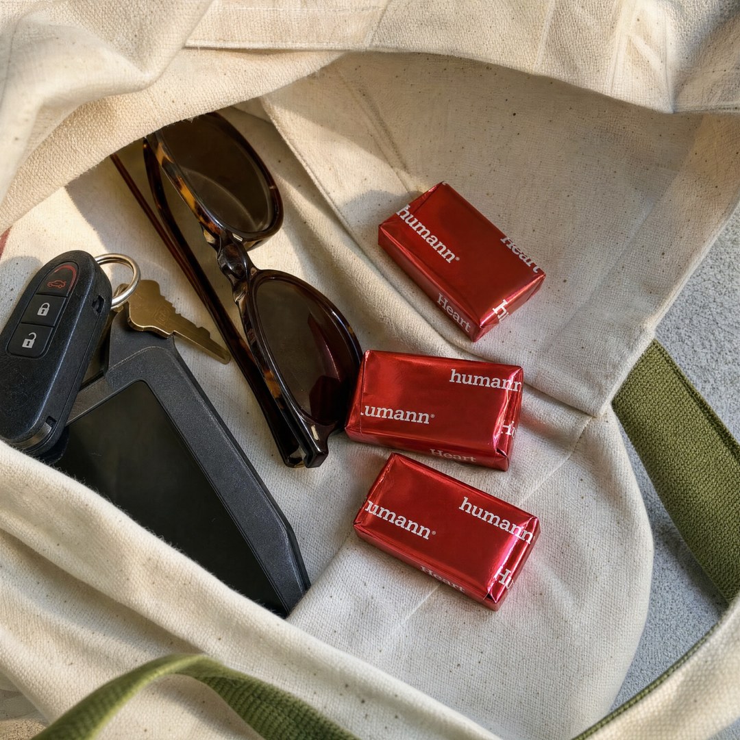 Foil-wrapped heart chews in a tote bag pocket