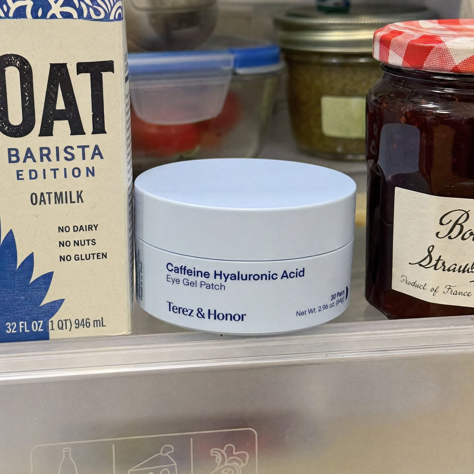 Terez and Honor eye patch jar on a refrigerator shelf