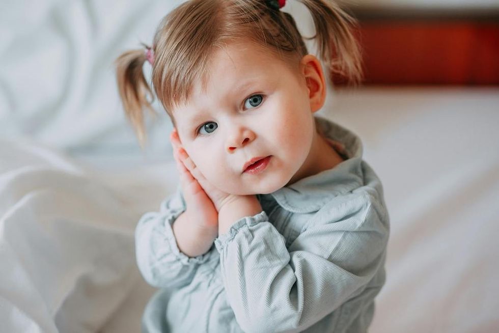 a baby posing for a photo
