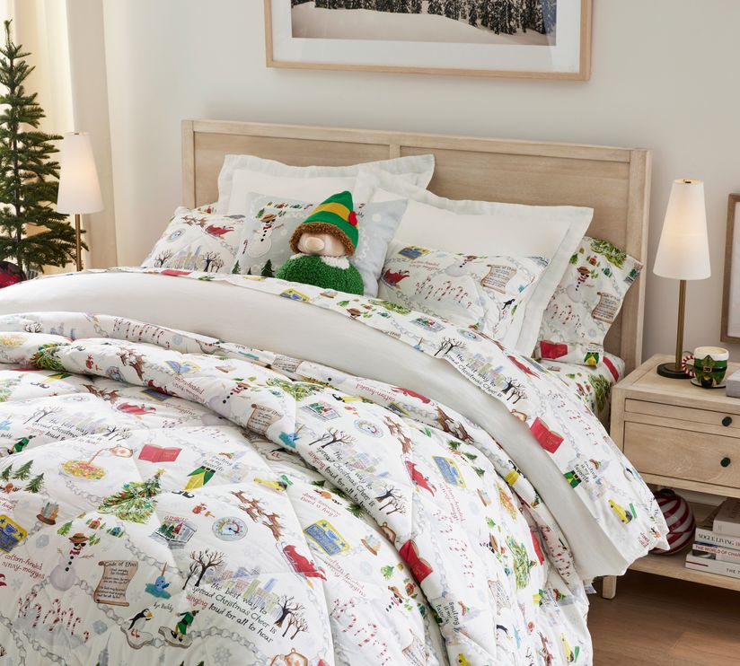 https://www.brit.co/media-library/a-bed-is-made-with-the-pb-x-elf-comforter-and-sheet-set.jpg?id=48196487&width=824&quality=90