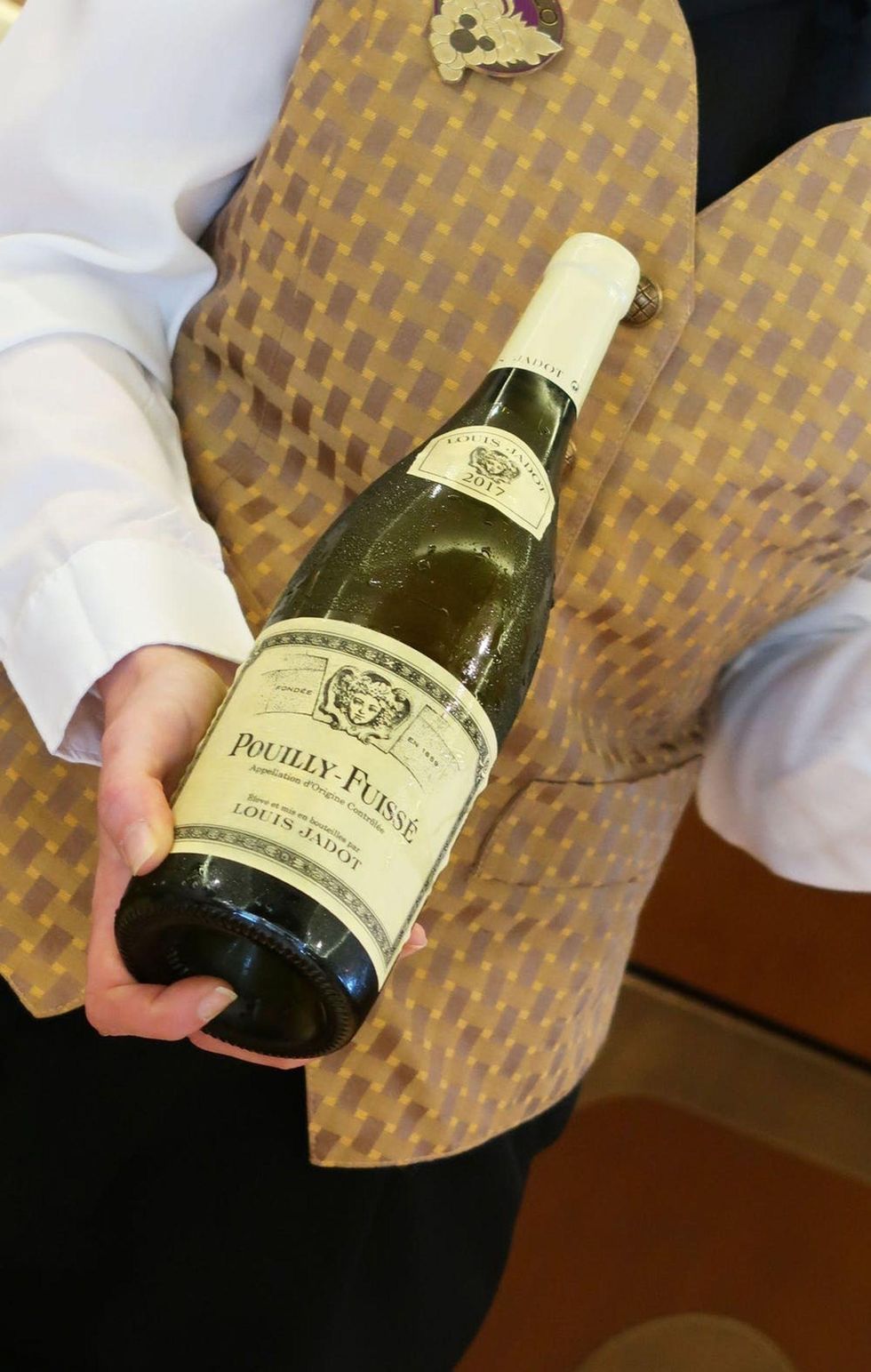 a bottle of pouilly-fuisse