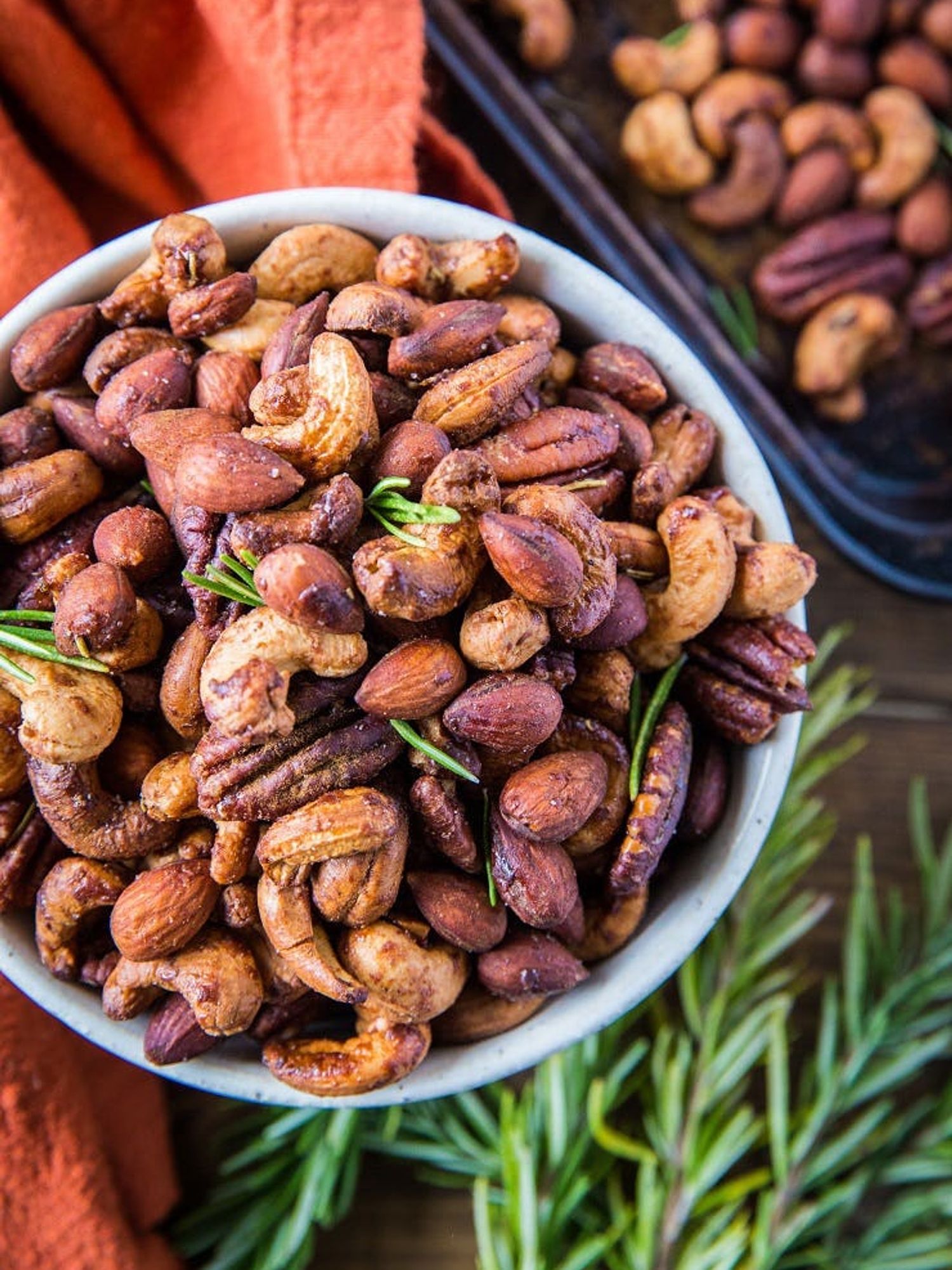 A bowl full of Maple Rosemary Roasted Nuts