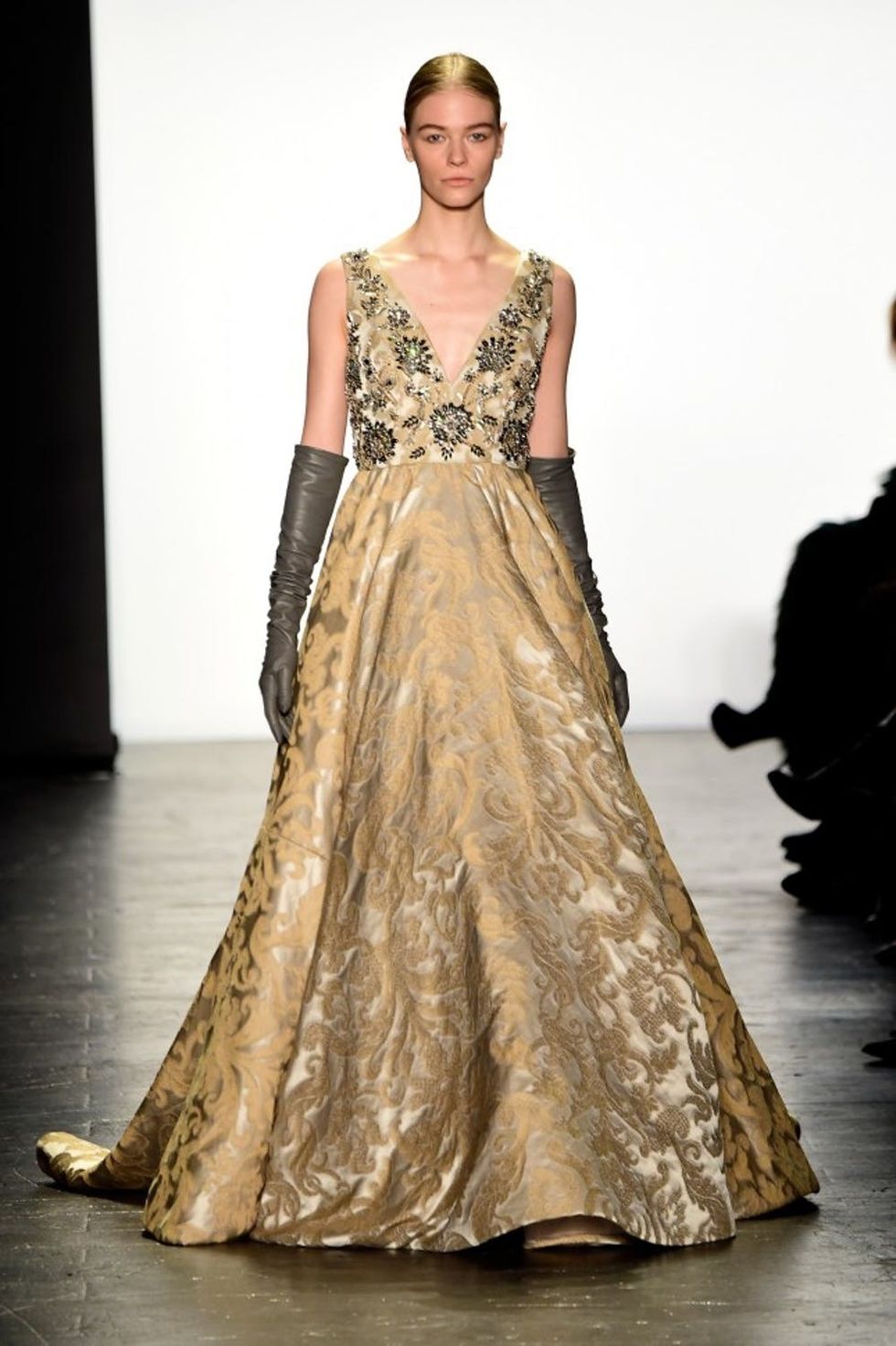 A model walks the runway wearing Dennis Basso Fall 2016 during New York Fashion Week: The Shows at The Arc, Skylight at Moynihan Station on February 16, 2016 in New York City.