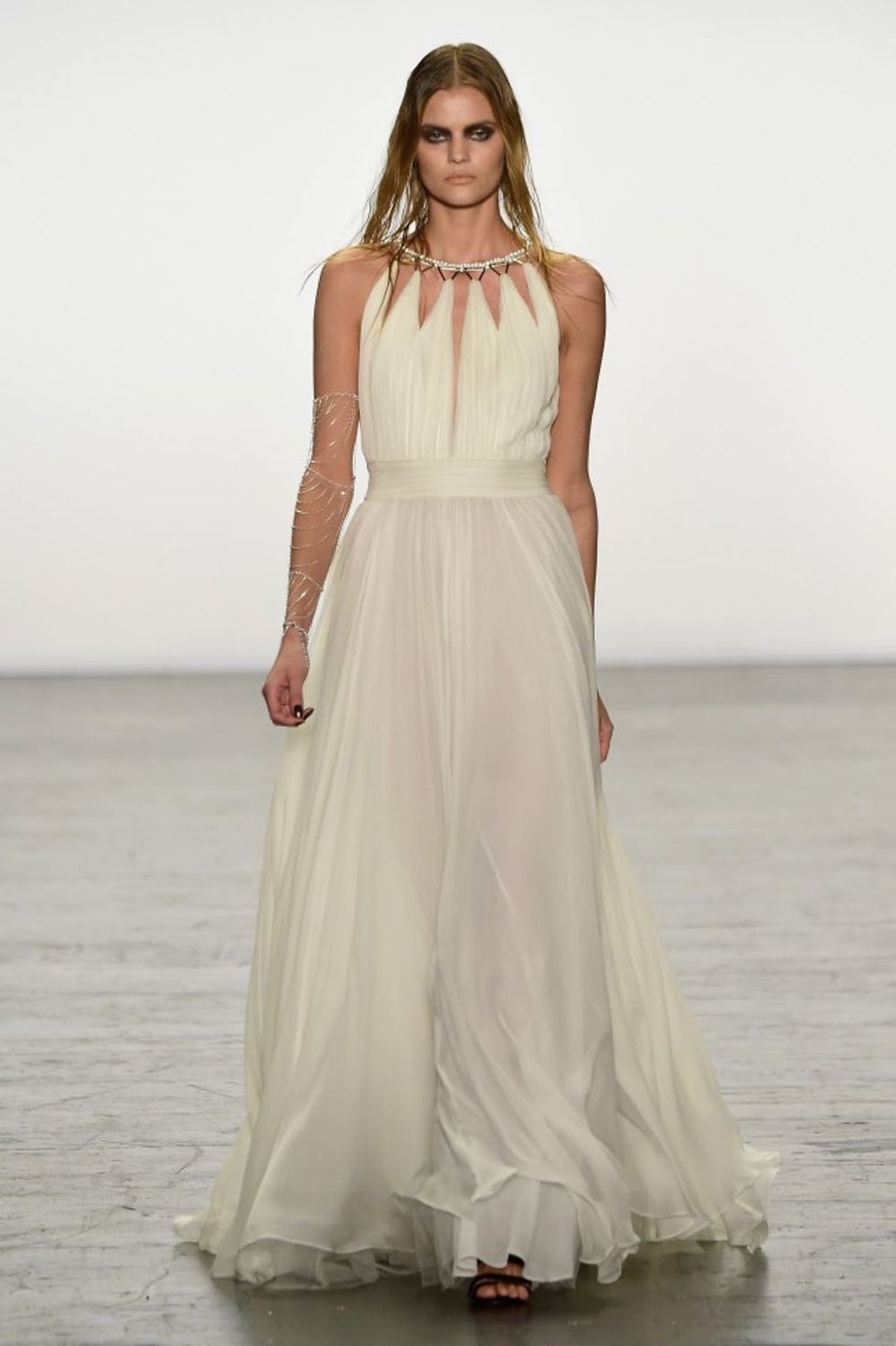 A model walks the runway wearing Tadashi Shoji Fall 2016 during New York Fashion Week: The Shows at The Arc, Skylight at Moynihan Station on February 12, 2016 in New York City.