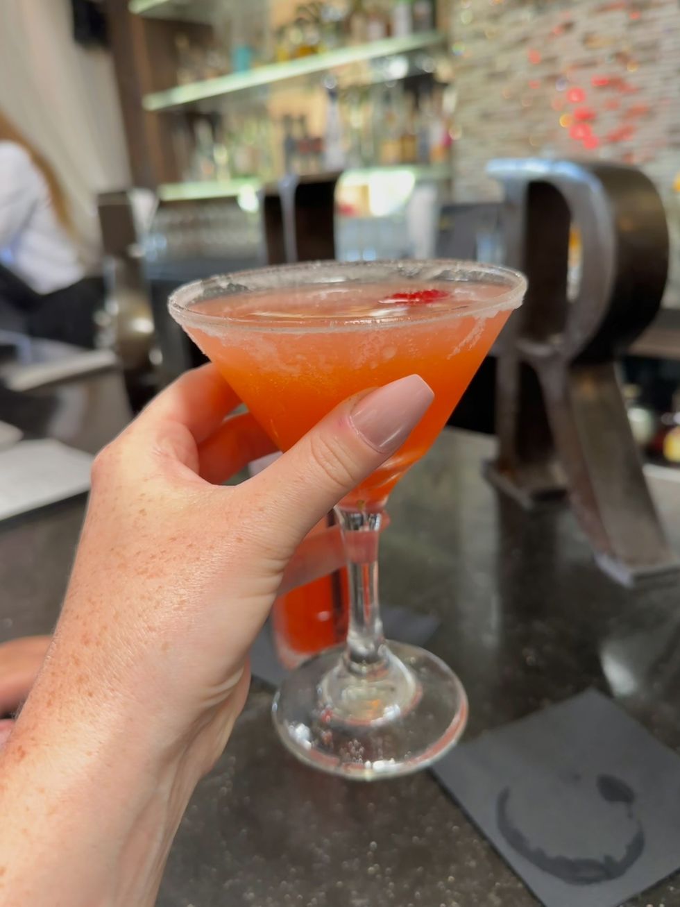 a pumptini cocktail at sur restaurant