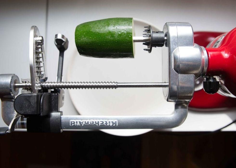 a spiralizer tool and a zucchini