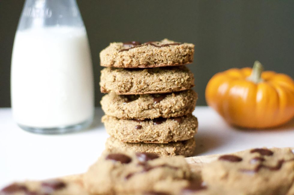 A stack of Paleo Halloween Pumpkin chocolate chip Cookies