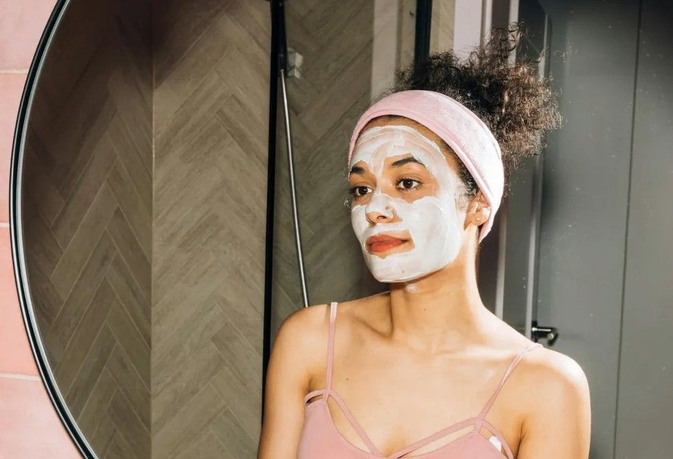 a woman doing skincare