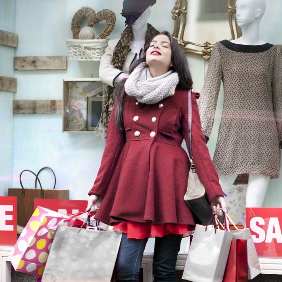 A woman takes a break while shopping