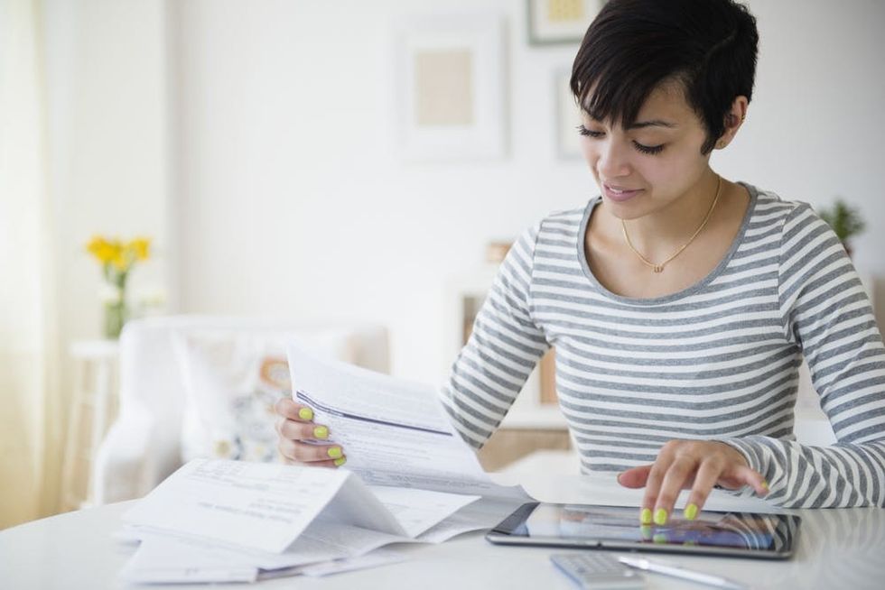 A woman updates her budget