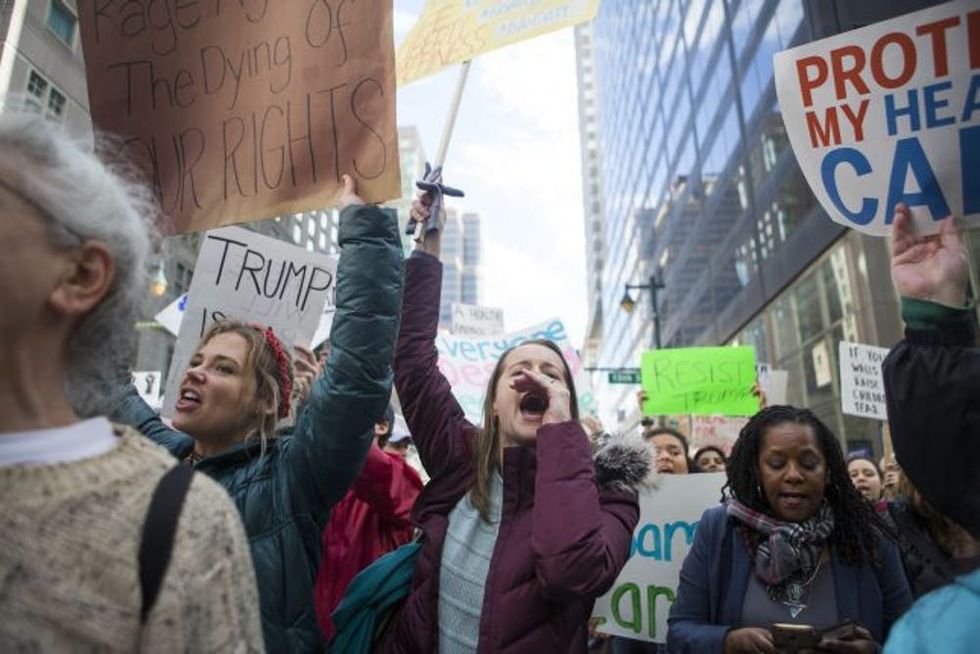 Activists Rally Outside GOP Retreat In Philadelphia During Trump Visit