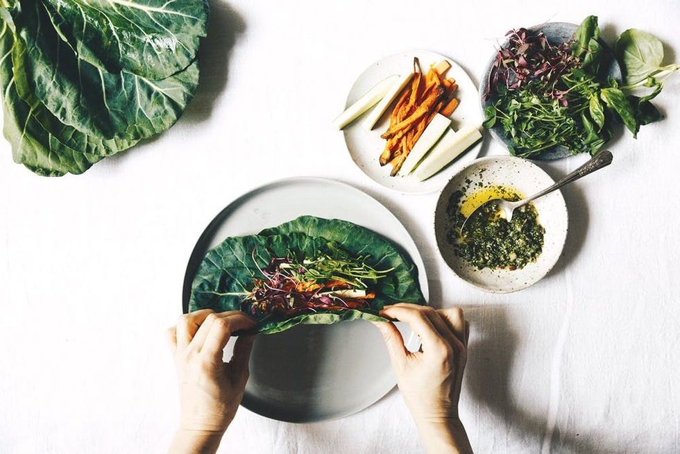 Add your fillings into the middle of the collard green wraps from the More with Less cookbook.