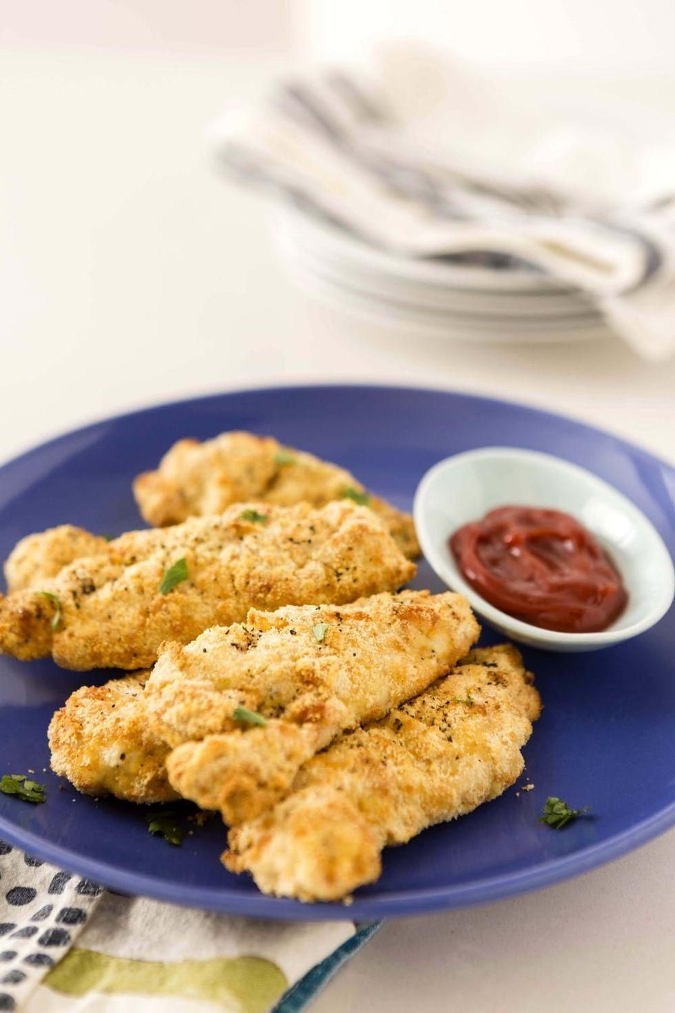 air-fried chicken tender recipes with ketchup on a blue plate