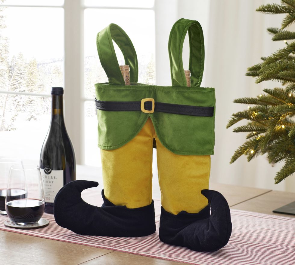 An Elf double wine bag is sitting on a wooden table.