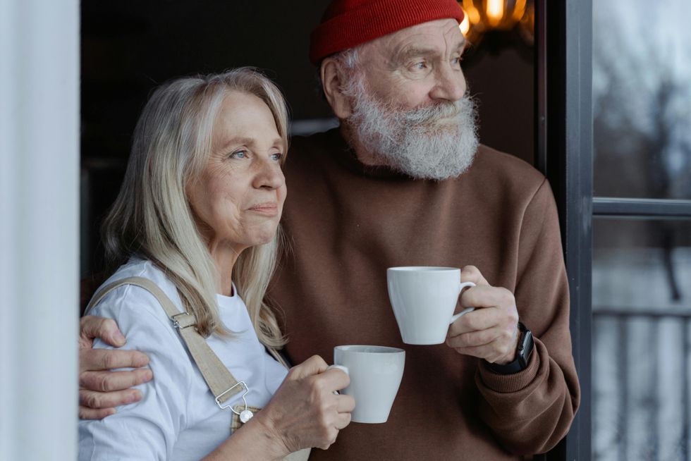 an older couple with their morning coffee