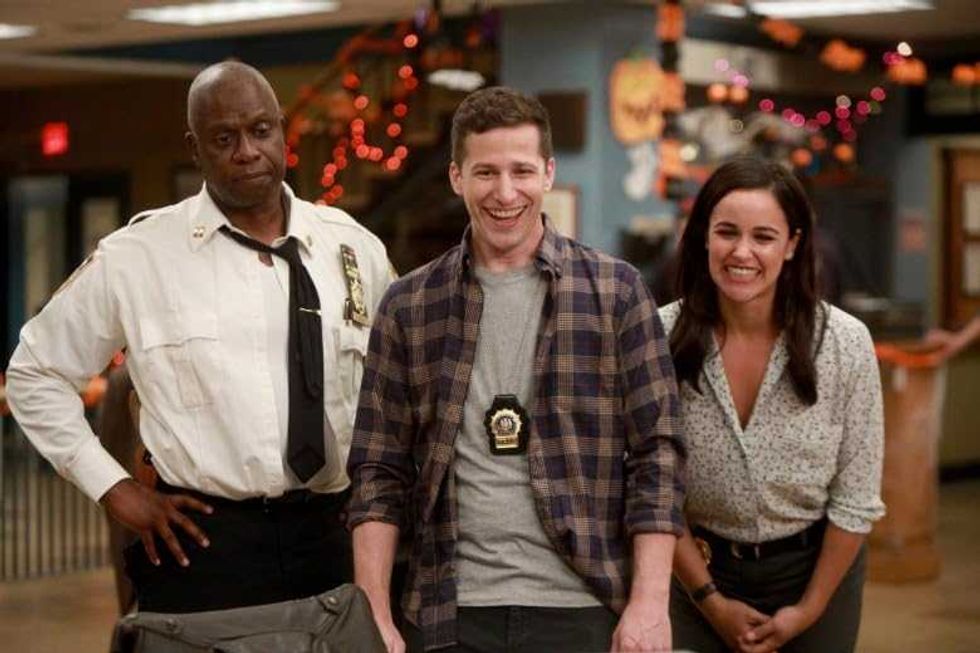 Andre Braugher, Melissa Fumero, and Andy Samberg in Brooklyn Nine-Nine