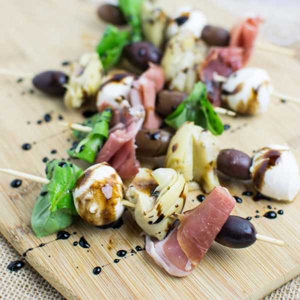 Antipasto Skewers on a cutting board