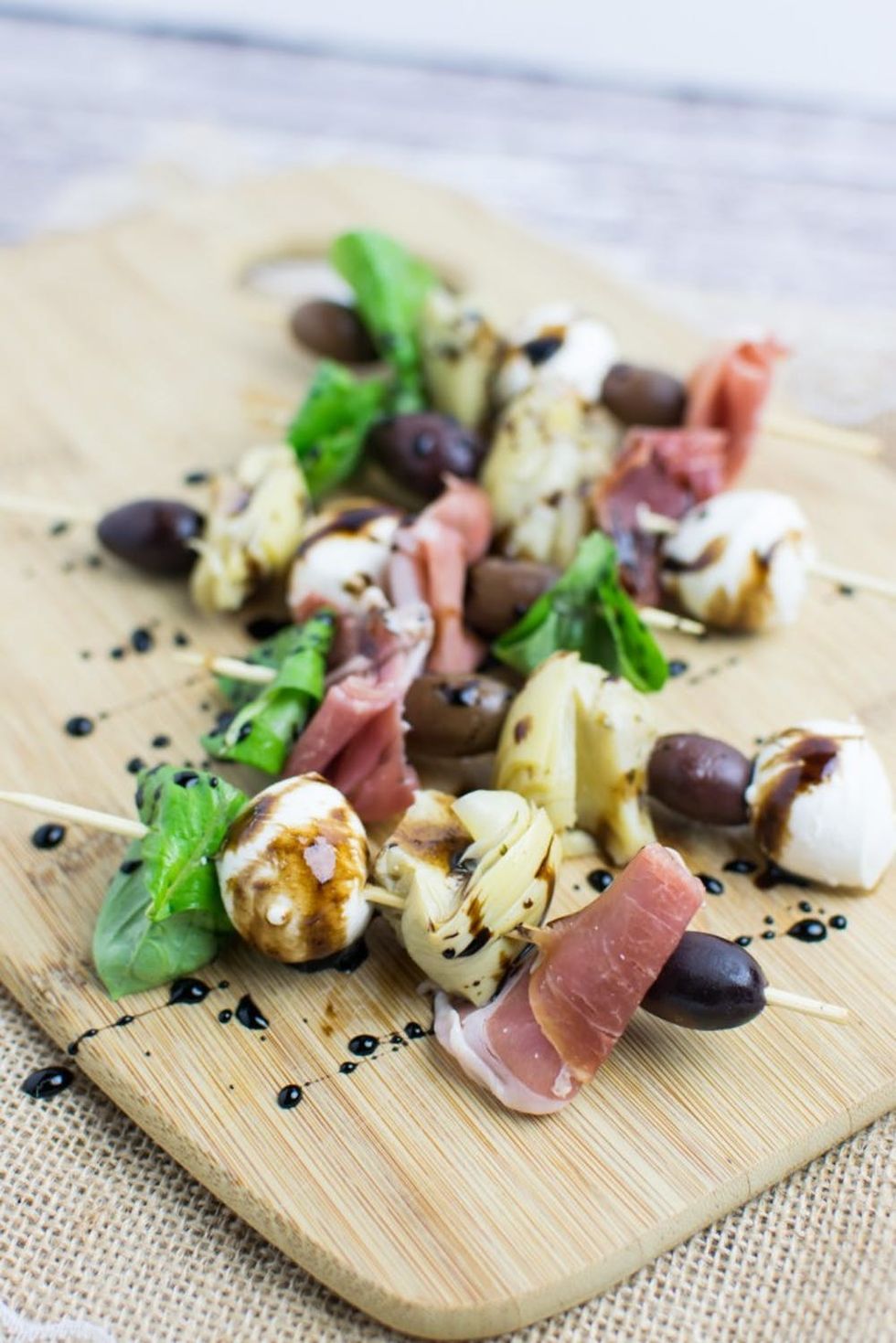 Antipasto Skewers on a cutting board