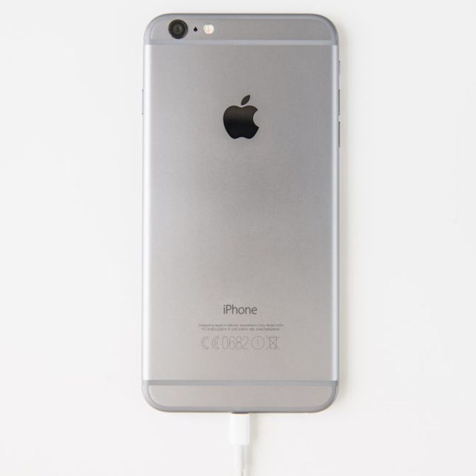 Apple iPhone 6 Silver backside and charger cable
