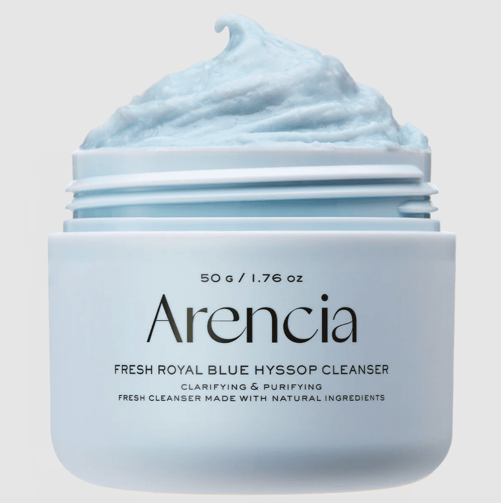 Arencia blue hyssop cleanser jar with whipped cream texture on top.