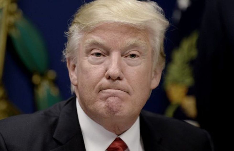 ARLINGTON, VA - JANUARY 27: U.S. President Donald Trump signs executive orders in the Hall of Heroes at the Department of Defense on January 27, 2017 in Arlington, Virginia. Trump signed two orders calling for the "great rebuilding" of the nation's military and the "extreme vetting" of visa seekers from terror-plagued countries. (Photo by Olivier Douliery-Pool/Getty Images)