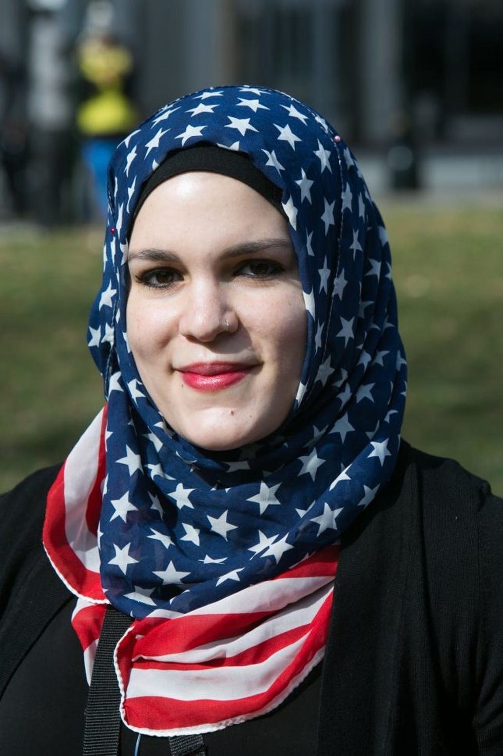 ATLANTA, GA - FEBRUARY 04: Angelica Hill, practicing Muslim, wears an American flag hijab during an Interfaith Rally for Muslims and Refugees at the Lutheran Church of the Redeemer on February 4, 2017 in Atlanta, Georgia. Hill, whose husband is an immigrant from Ghana, commented "thanks to immigration, I have the family I have." Activists gathered in Atlanta to protest President Trump's immigration ban. (Photo by Jessica McGowan/Getty Images)