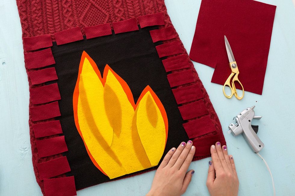 attaching the felt to the sweater dress