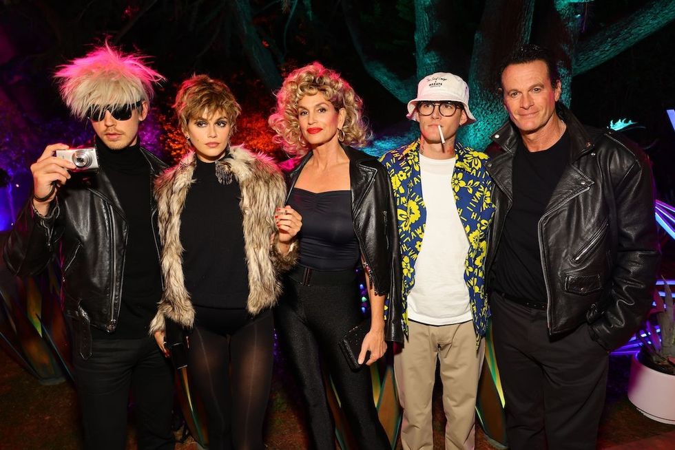 Austin Butler as Andy Warhol, Kaia Gerber as Edie Sedgwick, Cindy Crawford as Sandy from Grease, Presley Gerber as a tourist, and Rande Gerber as Danny from Grease