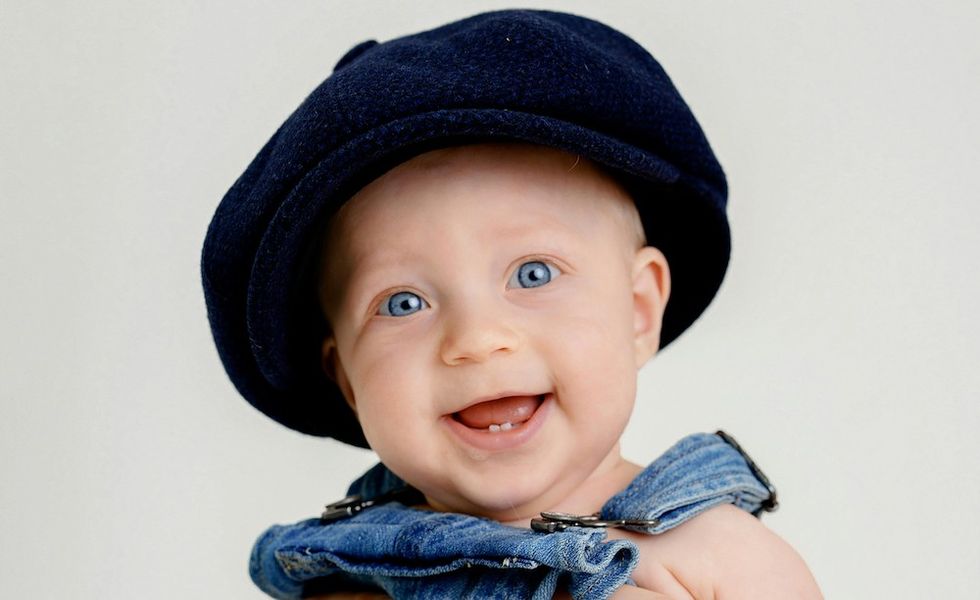 baby boy in a big hat