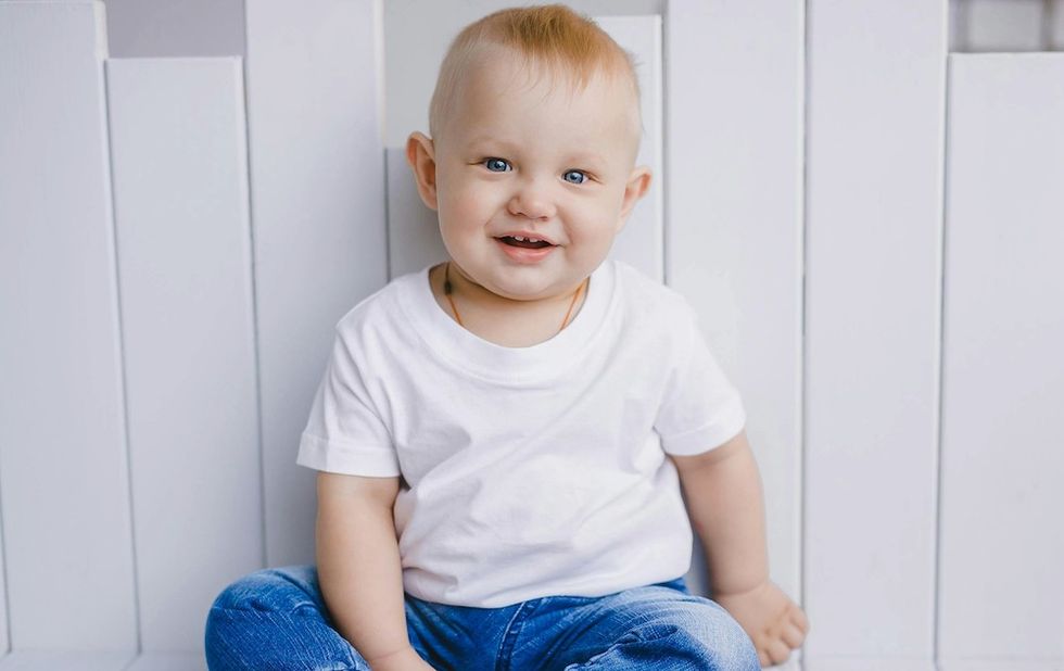 baby boy sitting down