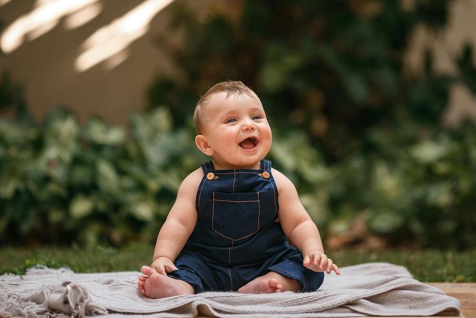 baby boy wearing overalls