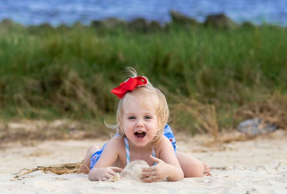 baby girl at the beach