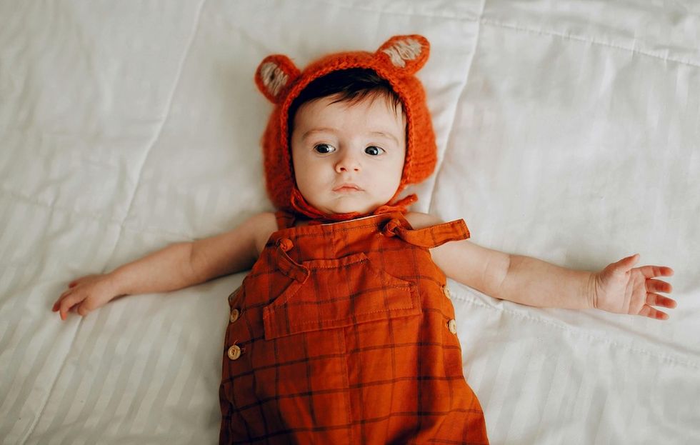 baby in a fox hat