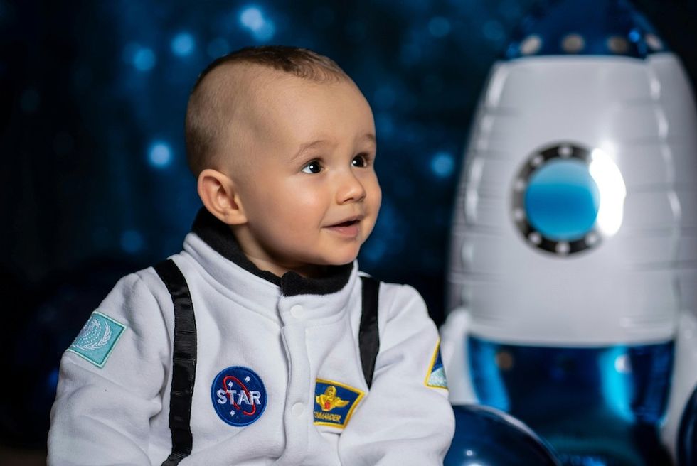 baby in an astronaut suit