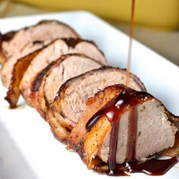 Bacon Wrapped Pork Tenderloin With Cherry Bourbon Sauce