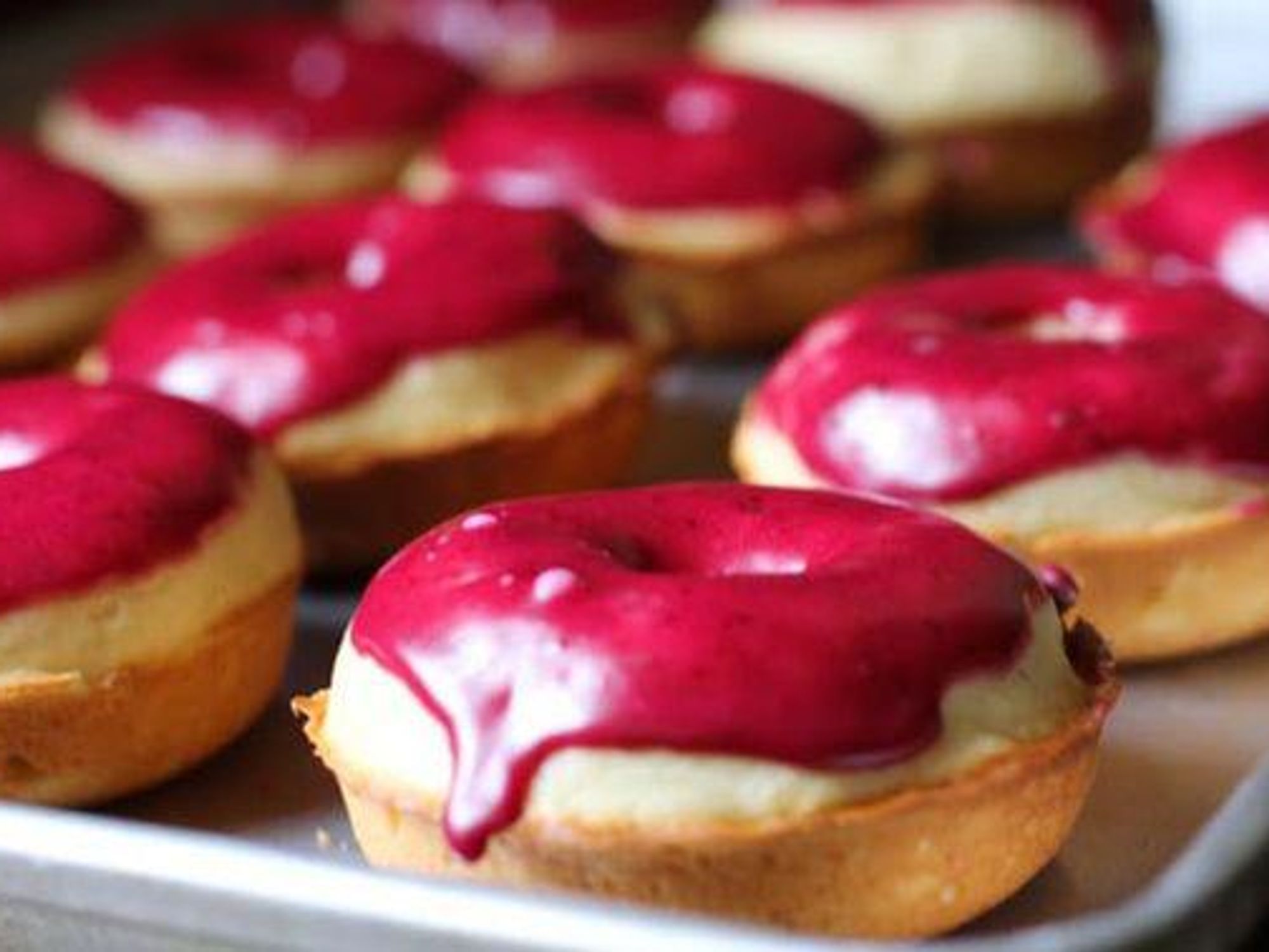 Baked Nutmeg Donuts with Berry Icing