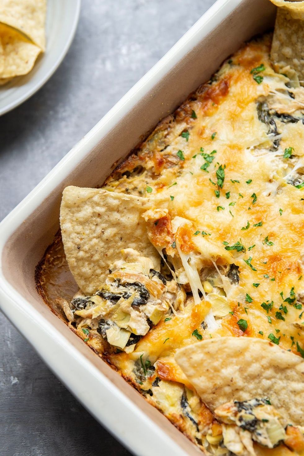 Baked Spinach Artichoke Dip with Caramelized Onions