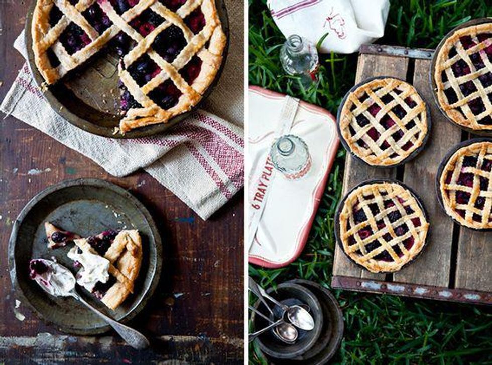 berry pie on wooden table with maroon striped napkins