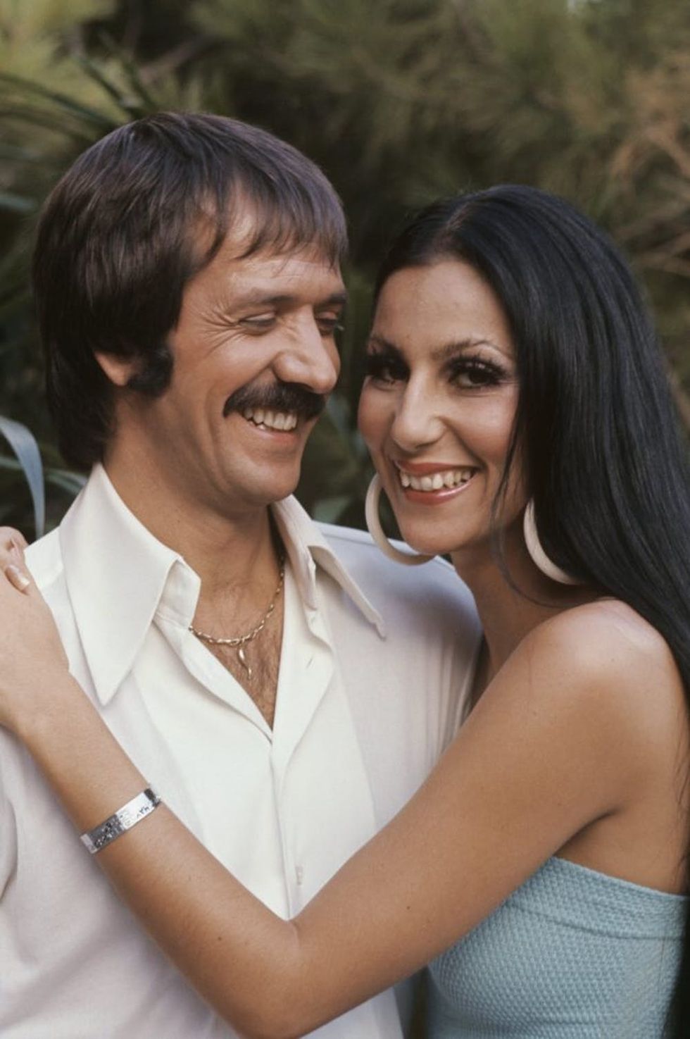BEVERLY HILLS, CA - CIRCA 1970: Singers and TV stars Sonny and Cher pose for a portrait at home in Beverly Hills, California. (Photo by Martin Mills/Getty Images)