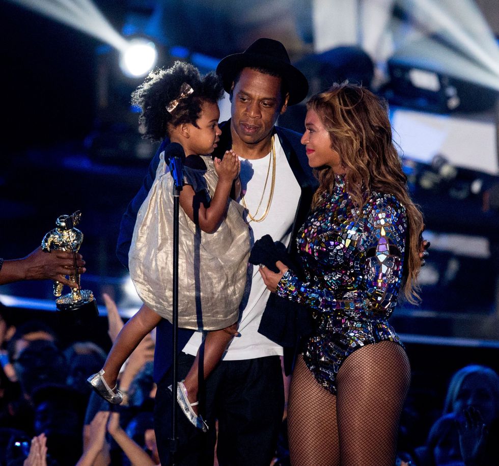 Beyonc\u00e9 and her daughter Blue Ivy onstage with Jay-Z