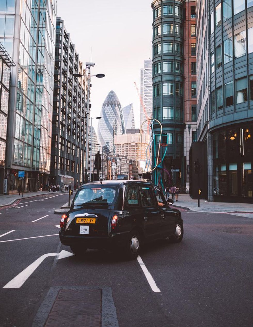black cab in london near the gherkin