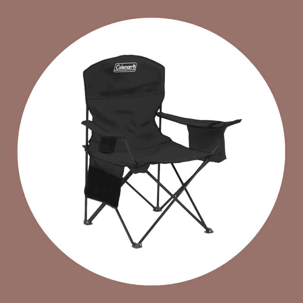 Black folding camping chair with armrests on a white circle background.