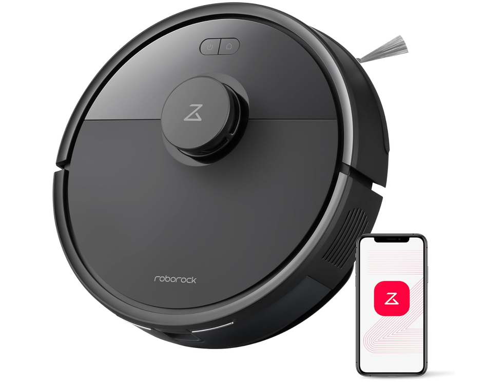 Black robotic vacuum cleaner with smartphone and control app.