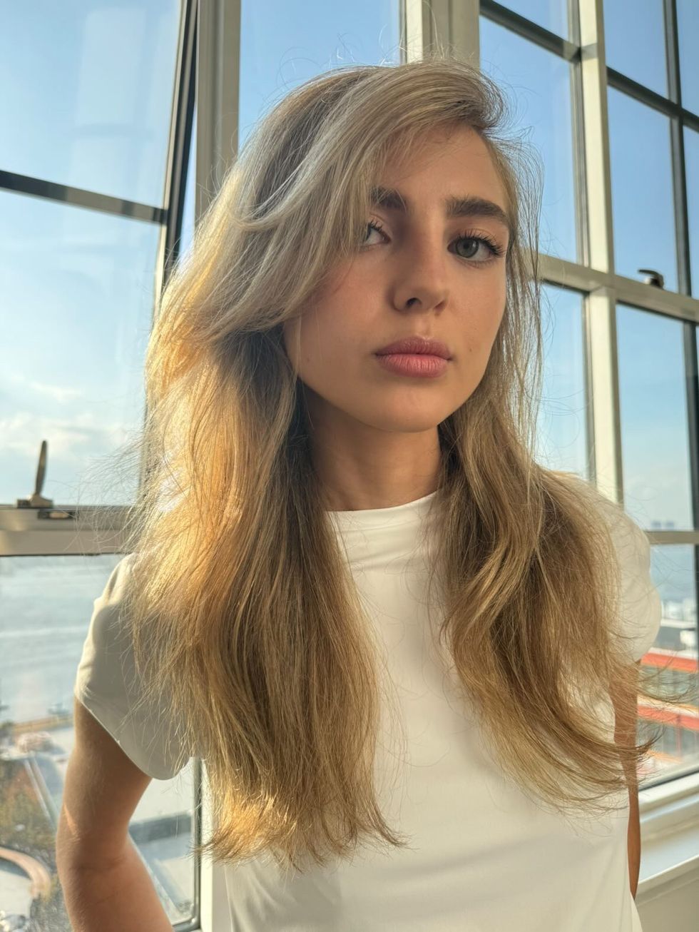 blonde woman with a layered haircut