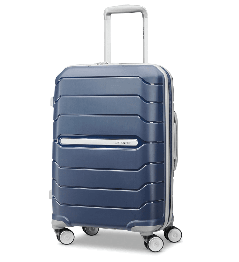 Blue hard-shell suitcase with a telescopic handle and four wheels.
