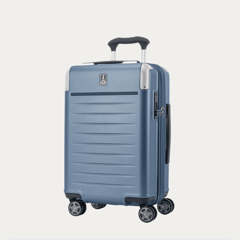 Blue hard-shell suitcase with four wheels and telescopic handle.