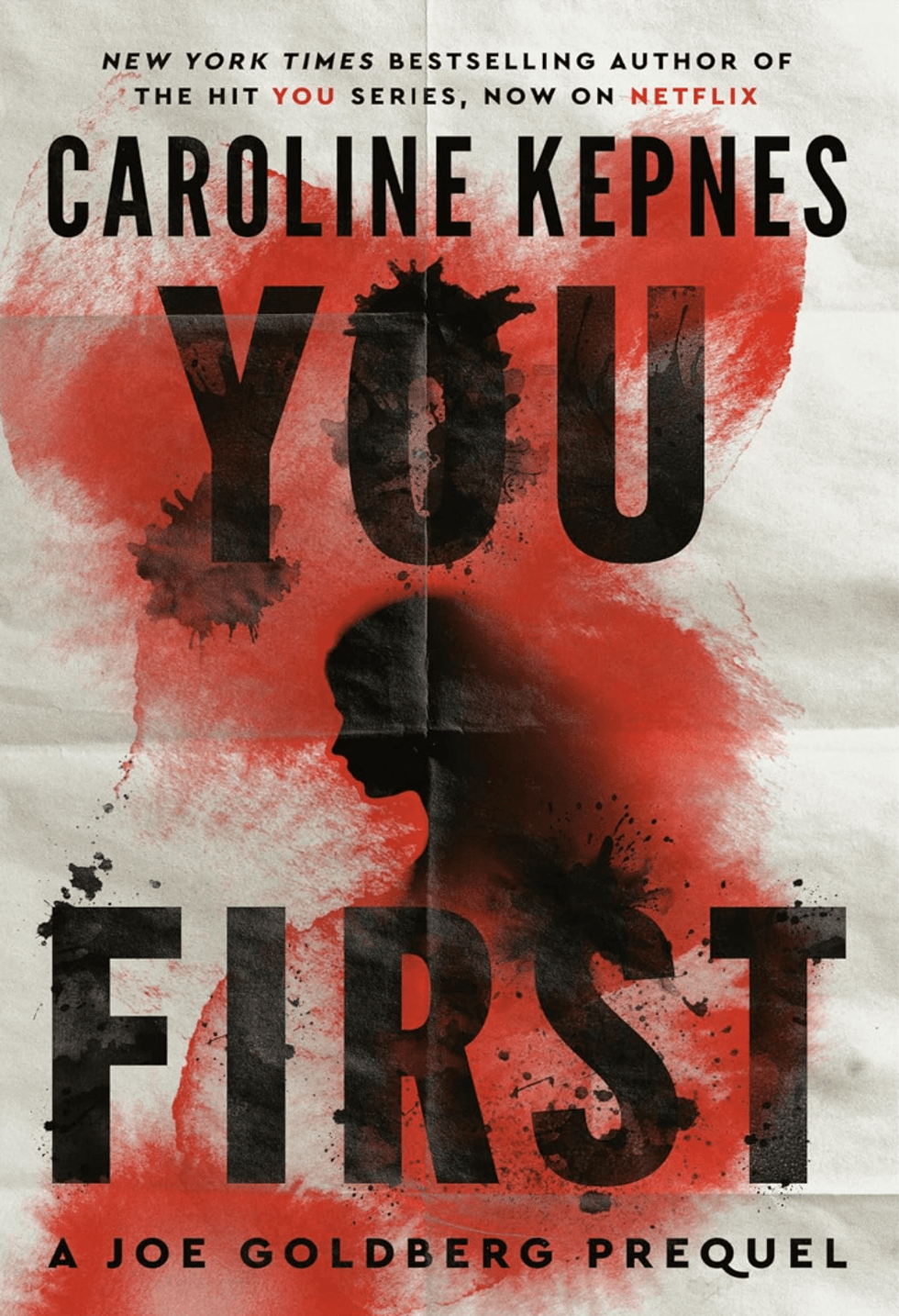 Book cover for "You First" by Caroline Kepnes; red and black abstract design.