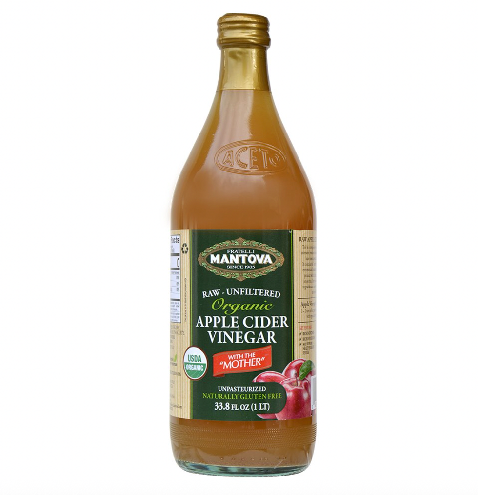 Bottle of Fratelli Mantova organic apple cider vinegar, 33.8 fl oz, with green label.