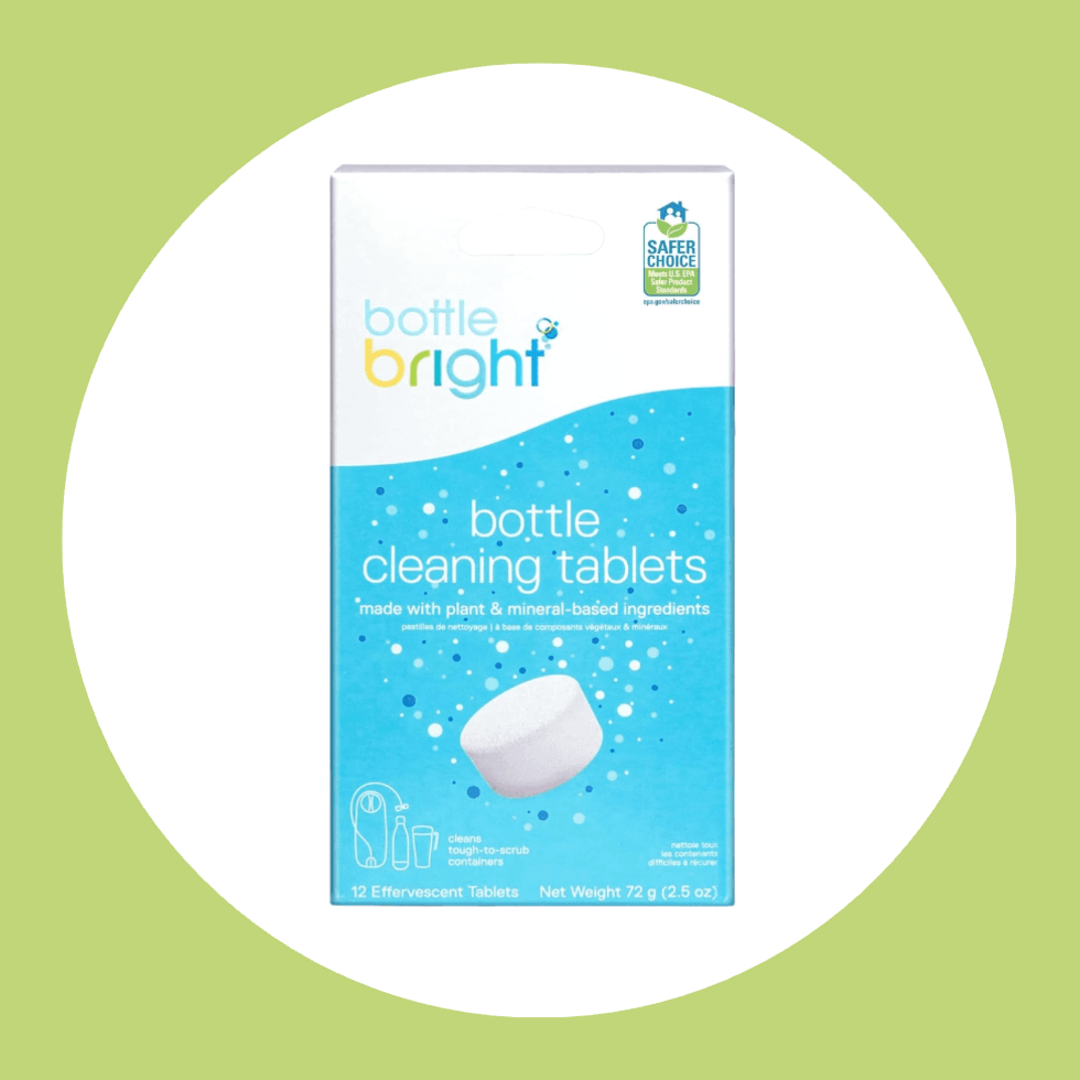 Box of Bottle Bright cleaning tablets on a green background.